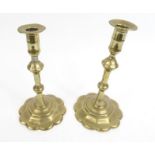 Pair of 18th century brass petal based candlesticks, 22cm high : For Condition Reports please