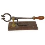 Victorian cast iron and brass sugar cane cutter, mounted on a wooden base, 35cm long : For Condition