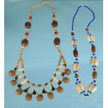 Oriental nut necklace together with a shell necklace : For Condition Reports please visit www.