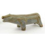 Two Inuit tribal hardstone carved polar bears and a hunting eskimo, the foot inscribed 'Alooloo?',