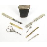 19th Century leather cased etui with folding fork, penknife, scissors, spoons, pencil, etc, 10cm