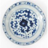 Oriental Chinese porcelain dish hand painted with an abstract pattern, character mark to base,