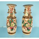 Pair of oriental stoneware vase decorated with warriors on horseback, 24cm high : For Condition