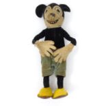 1920/30s Mickey Mouse felt toy with green shorts and yellow shoes, registered number 750811, 18cm