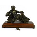 French style bronze figure of a reclining female reading a book on a chaise, raised on a mahogany