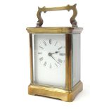 Brass carriage clock - R & Co Made in Paris, 10cm high excluding the handle : For Condition