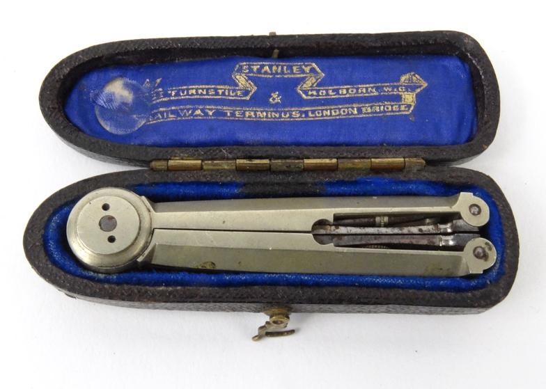 Boxed Stanley folding compass, together with a pair of brass compass divides stamped 'W&HC', 18cm - Image 2 of 3