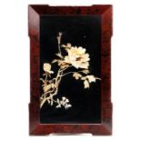 Oriental rectangular lacquered panel decorated in relief with carved ivory flowers, 74cm x 48cm :