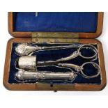 Rosewood cased sterling silver sewing set, the scissors 9.5cms long : For Condition Reports please