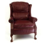 Burgundy leather manual reclining armchair with ball and claw feet : For Condition Reports please