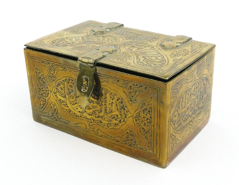 Middle Eastern rectangular brass box with embossed and chased decoration and script, 11cm in