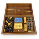 Edwardian mahogany cased games compendium with chessboard exterior and backgammon interior