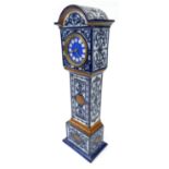 Arts and Crafts style pottery grandfather mantel clock with blue enamel dial, numbered 8965 to base,