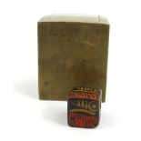 Oriental Chinese bronze scroll weight with wooden dice, character marks to inside, 4cm high : For