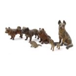 Six miniature cold painted bronze animals including a bulldog, husky and an Alsatian, the largest