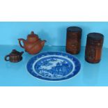 Oriental items including a pair of carved bamboo pots and covers, two terracotta teapots and a