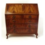 Mahogany bureau, the fall enclosing a fitted interior, 105cm high x 95cm wide : For Condition