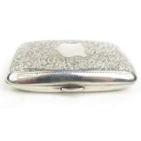 Rectangular silver cigarette case with floral cased decoration, WHH Birmingham 1909-10, 10.5cm