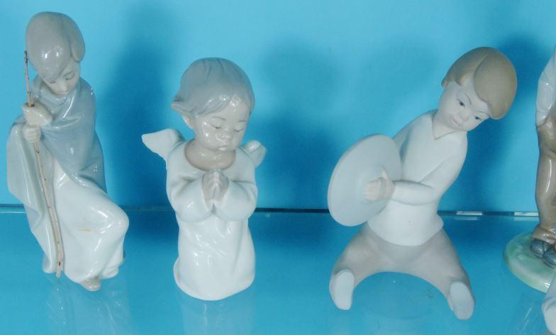 Four Lladro China figures and two Nao figures, the largest 18.5cm high : For Condition Reports - Image 2 of 5