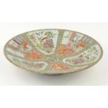 Large oriental porcelain bowl decorated with figures, birds and flowers, 47.5cm diameter : For