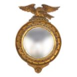 Carved pine gold painted mirror with eagle crest, 54cm long : For Condition reports please visit