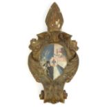Continental painted and carved wooden religious wall hanging with crest, German paper label to back,