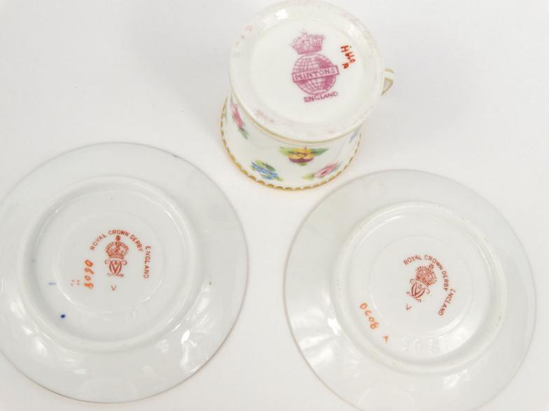 Two miniature Royal Crown Derby porcelain cups and saucers hand painted with flowers, together - Image 8 of 8