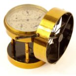 Brass air meter, number 1043, with silvered dial, housed in a wooden box, 9cm high : For Condition