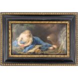 Continental porcelain plaque hand painted with a maiden reading a book in a cave, mounted in a black