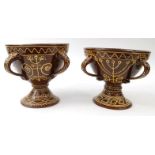 Large pair of pottery three handled tygs with trailed slipware decoration, each 21cms high : For