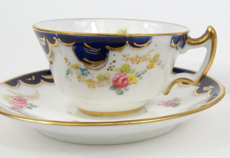 Two miniature Royal Crown Derby porcelain cups and saucers hand painted with flowers, together - Image 4 of 8