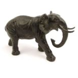 Green patented bronze model of an elephant, 28cm long : For Condition reports please visit www.