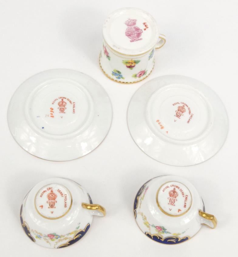 Two miniature Royal Crown Derby porcelain cups and saucers hand painted with flowers, together - Image 6 of 8