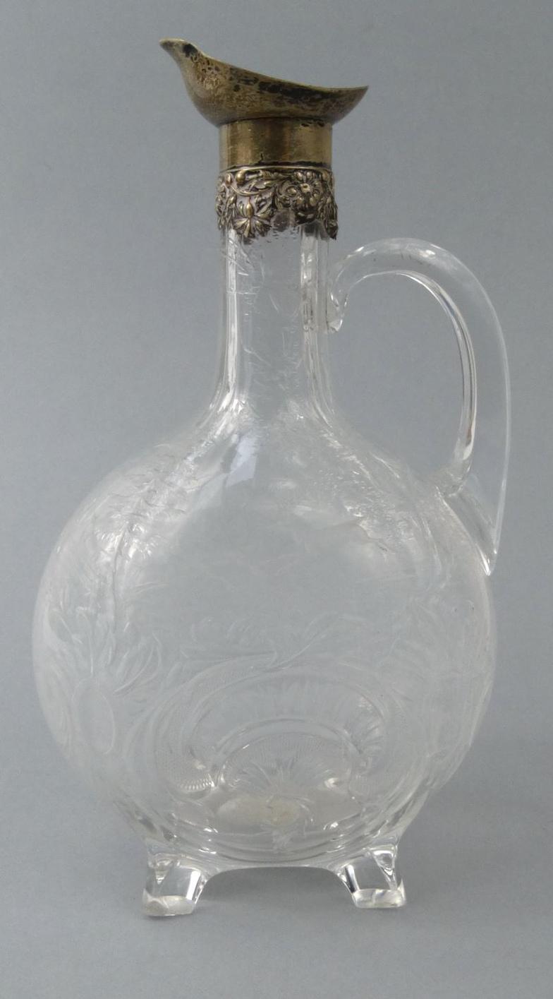 Victorian cut glass decanter engraved with deer and flowers, the silver collar London 1912-13, 34.