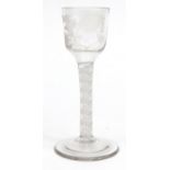 Antique wine glass with spiral twist stem, engraved with flowers, 15cm high : For Condition