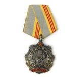 Military interest Russian medal with red enamel decoration, hammer and sickle, numbered 33300 to