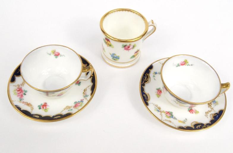 Two miniature Royal Crown Derby porcelain cups and saucers hand painted with flowers, together - Image 2 of 8