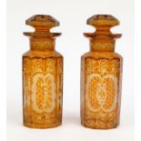 Pair of Victorian amber flashed glass jars decorated with animals and flowers, 22cm high : For