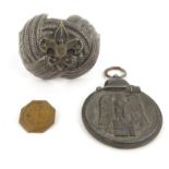Military interest German 1941-42 Eastern front medal, winged badge and a pommel, the medal 4cm