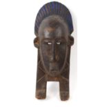 Large carved wooden tribal mask with blue painted decoration, 53cm high : For Condition Reports