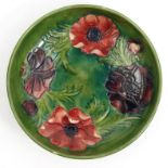 Moorcroft Anenome patterned pottery shallow bowl, impressed mark to base, 22cm diameter : For