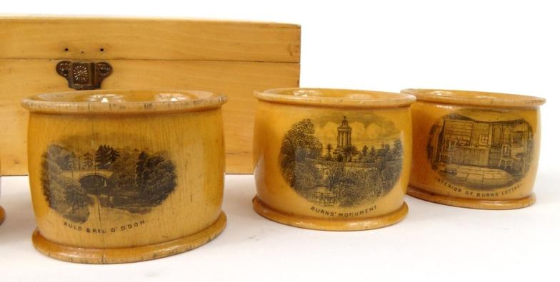Boxed set of six wooden Mauchlin ware napkin rings decorated with Robbie Burns, the lid decorated - Image 2 of 5