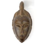 Large carved wooden tribal face mask, 60cm high : For Condition Reports please visit www.