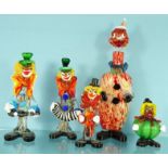 Four Murano glass clowns and a decanter, the decanter 42cm high : For Condition Reports please visit