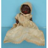 Small black Armand Marseille bisque headed doll, 20cm high : For Condition Reports please visit