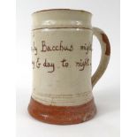 St Ives studio terracotta pottery tankard with cream glaze and a motto 'The Fudling-Cup by Bacchus