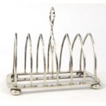 Silver six slice toast rack, Birmingham 1915-16, 13cm long : For Condition Reports please visit