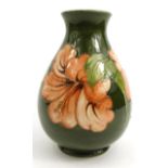 Moorcroft Hibiscus patterned pottery vase, Potters to the Late Queen Mary label to base, 23cm high :