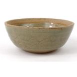 Katherine Pleydell Bouverie Studio celadon glazed pottery bowl with incised swirling decoration,