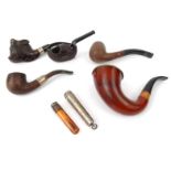 Selection of smoking interest wooden pipes including 'Eilard Marcon ' clog example, silver cased